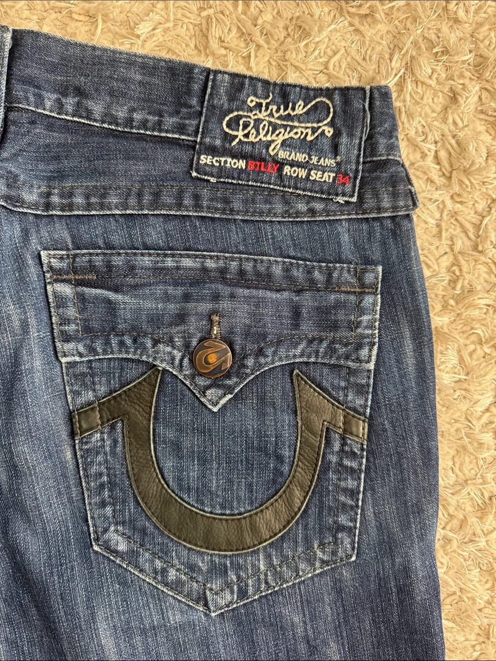 True Religion Women's Dark Blue Flare Jeans with Signature Back Pockets